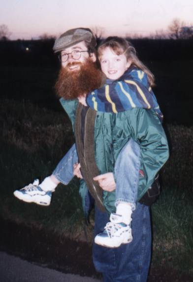 Me and 8 year old Laura Finley, my 5th cousin.>
<BR><BR>
This is my 5th cousin Laura and me by the family farm.<P><BR>
<BR><P><P><BR><P><BR><P><BR>
Okay, here's the photo-tour.  I've scanned in selections from my capacious photo-albums, so, click here:<BR>
<A HREF=